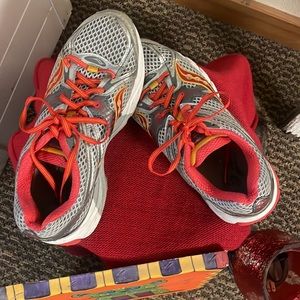 EUC Saucony guide athletic shoes. Burnt and light orange, and grey. Size 8.